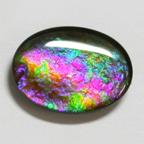 A picture containing accessory, enamel, colorful

Description automatically generated